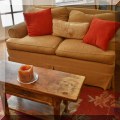 F26. Upholstered loveseat. 60&rdquo;w 